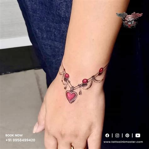 heart and chain tattoo